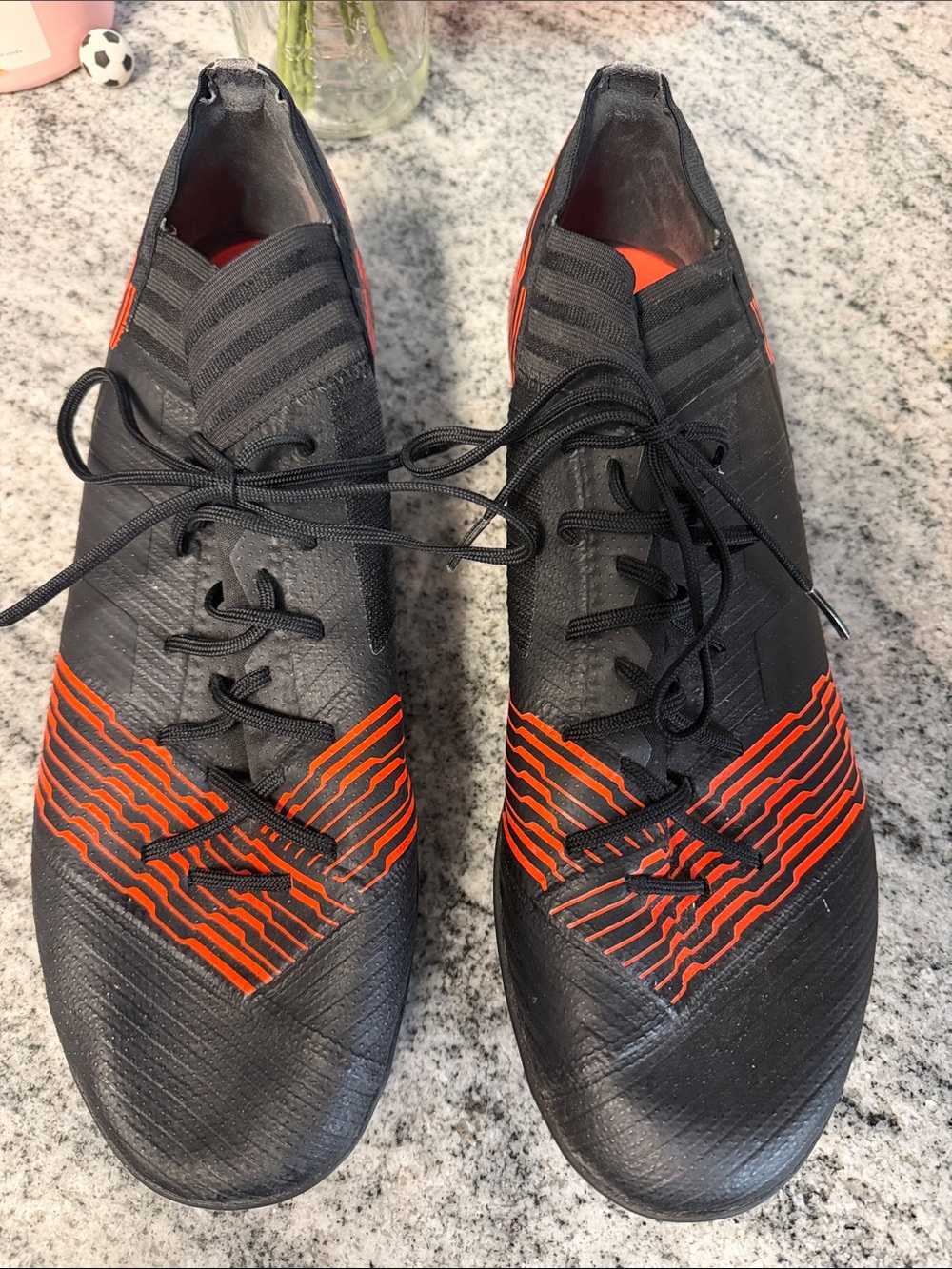 adidas Men's Black and Orange Soccer Cleat-Style Athletic Shoes